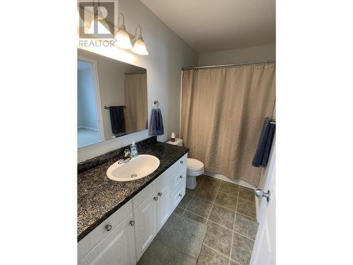 A 4415 Heritage Crescent, Fort Nelson, BC - Indoor Photo Showing Bathroom