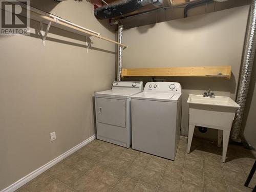 A 4415 Heritage Crescent, Fort Nelson, BC - Indoor Photo Showing Laundry Room