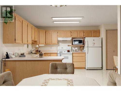 2477 Ingram Road Unit# 210, West Kelowna, BC - Indoor Photo Showing Kitchen With Double Sink
