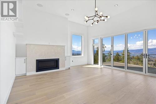2302 Lavetta Drive, Kelowna, BC - Indoor Photo Showing Living Room With Fireplace