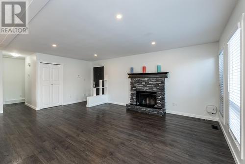 8249 St Lawrence Avenue, Prince George, BC - Indoor Photo Showing Living Room With Fireplace