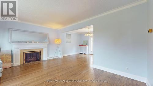 19 Strathgowan Cres, Toronto, ON - Indoor Photo Showing Living Room With Fireplace