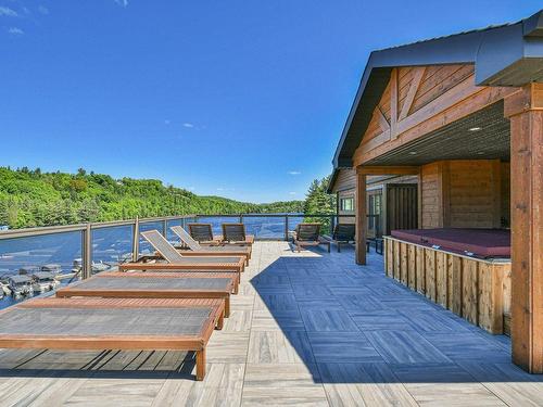 Patio - 302-50 Ch. Masson, Sainte-Marguerite-Du-Lac-Masson, QC - Outdoor With Body Of Water