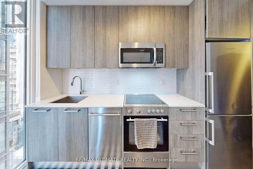810 - 28 Wellesley Street E, Toronto, ON - Indoor Photo Showing Kitchen With Stainless Steel Kitchen With Upgraded Kitchen