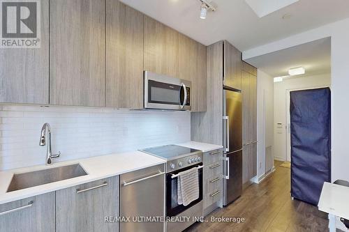 810 - 28 Wellesley Street E, Toronto, ON - Indoor Photo Showing Kitchen With Upgraded Kitchen