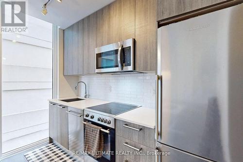 #810 -28 Wellesley St E, Toronto, ON - Indoor Photo Showing Kitchen With Stainless Steel Kitchen With Upgraded Kitchen
