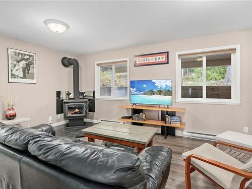 482 Becher Bay Rd, Sooke, BC - Indoor Photo Showing Living Room With Fireplace