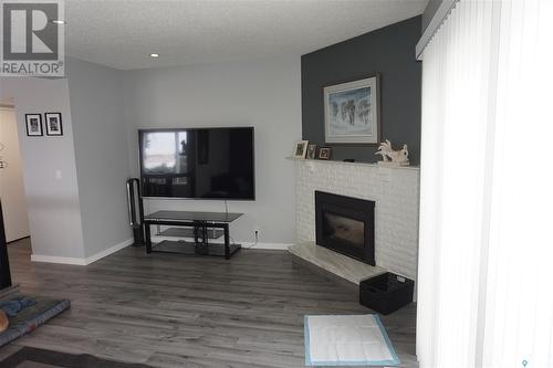 272 Plainsview Drive, Regina, SK - Indoor Photo Showing Living Room With Fireplace
