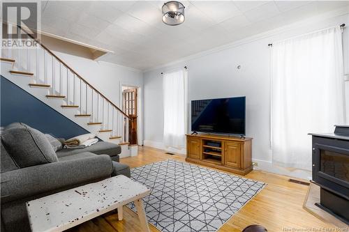 259 Main Street, Plaster Rock, NB - Indoor Photo Showing Living Room With Fireplace