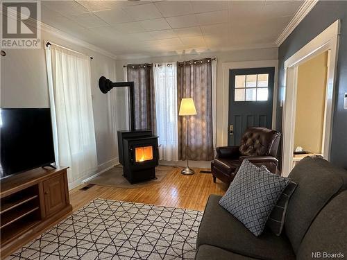 259 Main Street, Plaster Rock, NB - Indoor Photo Showing Living Room With Fireplace