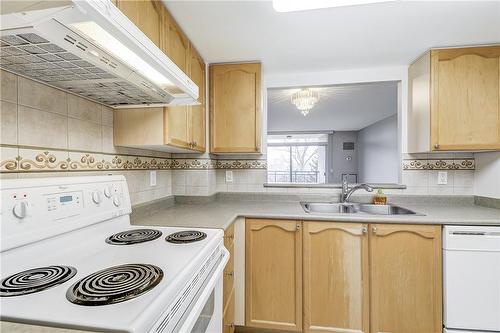 100 Burloak Drive|Unit #2403, Burlington, ON - Indoor Photo Showing Kitchen With Double Sink