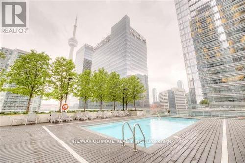 3105 - 65 Bremner Boulevard, Toronto, ON - Outdoor With In Ground Pool With Deck Patio Veranda