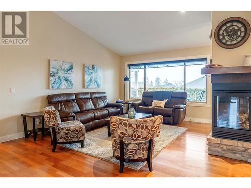 802 Breeze Place, Kelowna, BC - Indoor Photo Showing Living Room With Fireplace