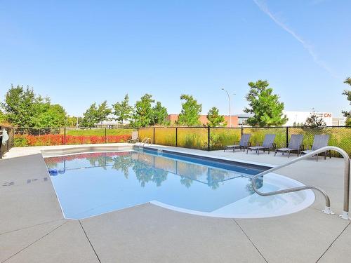 Piscine - 209-8255 Boul. Leduc, Brossard, QC - Outdoor With In Ground Pool With Backyard