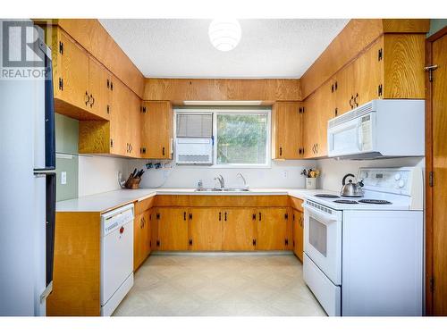 8201 Okanagan Landing Road, Vernon, BC - Indoor Photo Showing Kitchen With Double Sink