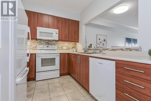 #220 -760 Woodhill Dr, Centre Wellington, ON - Indoor Photo Showing Kitchen With Double Sink