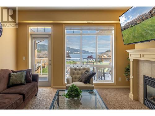3570 Woodsdale Road Unit# 305, Kelowna, BC - Indoor Photo Showing Living Room With Fireplace