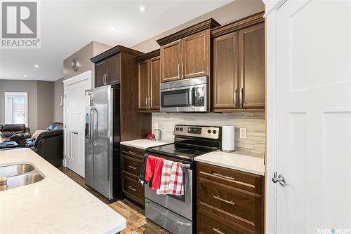 111B 108Th Street W, Saskatoon, SK - Indoor Photo Showing Kitchen With Double Sink