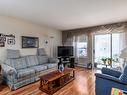 306-1329 Klo Road, Kelowna, BC  - Indoor Photo Showing Living Room 