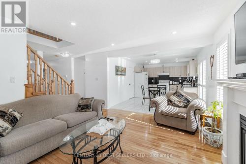 4 Beresford Cres, Brampton, ON - Indoor Photo Showing Living Room With Fireplace