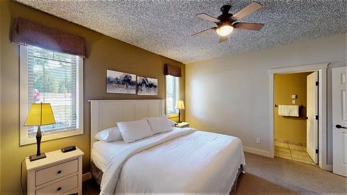 311 B - 300 Bighorn Boulevard, Radium Hot Springs, BC - Indoor Photo Showing Bedroom