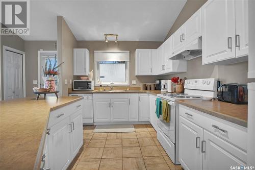 5702 Nelson Beach Drive, Wakaw Lake, SK - Indoor Photo Showing Dining Room With Fireplace