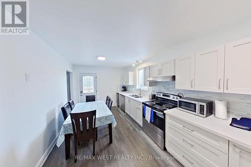 30 Bayswater Drive W, Wasaga Beach, ON - Indoor Photo Showing Kitchen With Double Sink