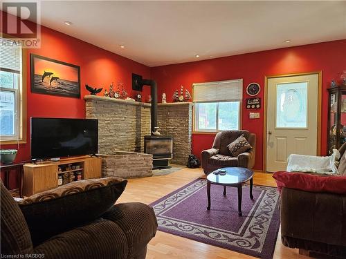 Large inviting living room - 49 Queen Street E, Hepworth, ON - Indoor Photo Showing Living Room With Fireplace