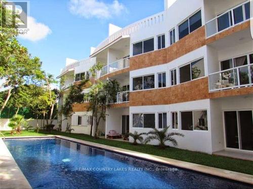 #301C -Luz Chemuyil St W, Mexico, ON - Outdoor With In Ground Pool With Balcony