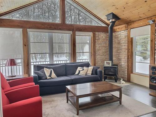 Solarium - 95 Rue Hélène, Rouyn-Noranda, QC - Indoor Photo Showing Living Room With Fireplace