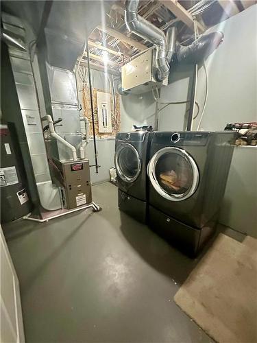 23 Grassland Crescent, Brandon, MB - Indoor Photo Showing Laundry Room