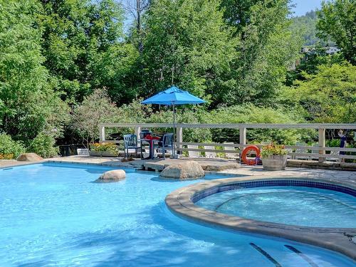 Pool - 9-102 Ch. Des Quatre-Sommets, Mont-Tremblant, QC - Outdoor With In Ground Pool With Backyard