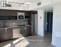 #308A -7 Mabelle Ave, Toronto, ON  - Indoor Photo Showing Kitchen With Stainless Steel Kitchen With Upgraded Kitchen 