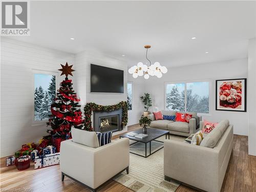 Virtual Rendering ready for Christmas! - 19 Grenville Street N, Southampton, ON - Indoor Photo Showing Living Room With Fireplace