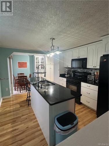 845 Route 172, Back Bay, NB - Indoor Photo Showing Kitchen With Double Sink