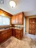 120 Burke Crescent, Swift Current, SK  - Indoor Photo Showing Kitchen With Double Sink 