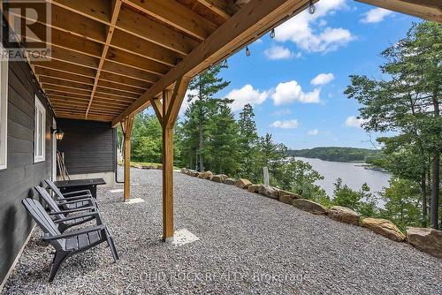 93 Hinchinbrooke Rd N, South Frontenac, ON - Outdoor With Body Of Water With Deck Patio Veranda