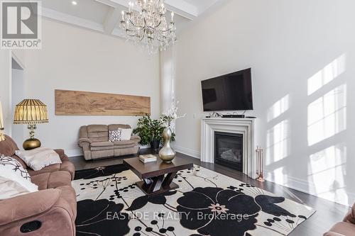 27 Sir Henry Court, King, ON - Indoor Photo Showing Living Room With Fireplace