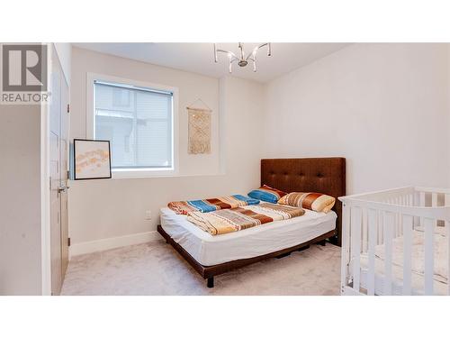 8792 Cortland Place, Coldstream, BC - Indoor Photo Showing Bedroom