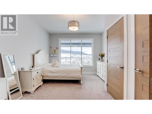 8792 Cortland Place, Coldstream, BC - Indoor Photo Showing Bedroom