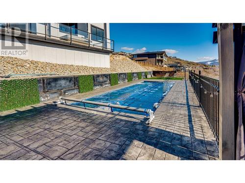 8792 Cortland Place, Coldstream, BC - Outdoor With In Ground Pool