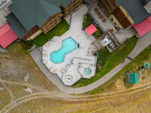 201 - 500 Stemwinder Drive, Kimberley, BC - Outdoor With In Ground Pool With View
