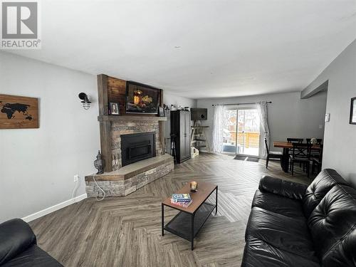 17 Birch St, Wawa, ON - Indoor Photo Showing Living Room With Fireplace