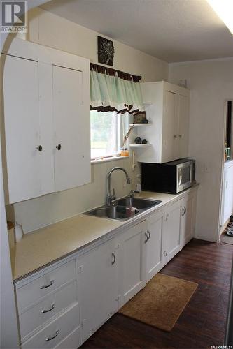 501 Front Street, Eastend, SK - Indoor Photo Showing Kitchen With Double Sink