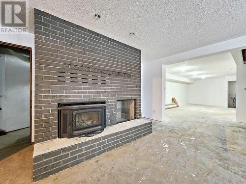 11170 Plett No 1 Road, Hixon, BC - Indoor Photo Showing Living Room With Fireplace