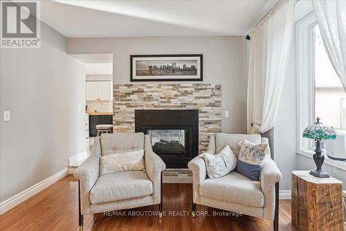 109 River Glen Blvd, Oakville, ON - Indoor Photo Showing Living Room With Fireplace