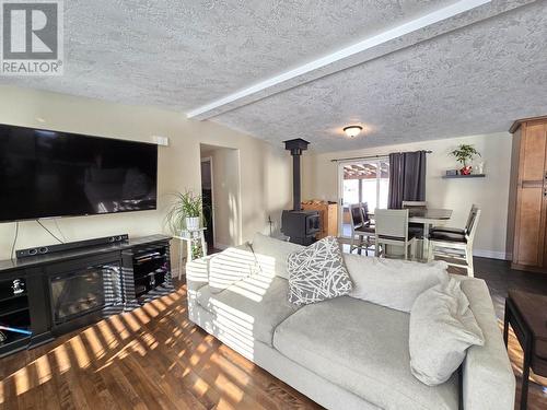 820 Beaven Crescent, Valemount, BC - Indoor Photo Showing Living Room With Fireplace