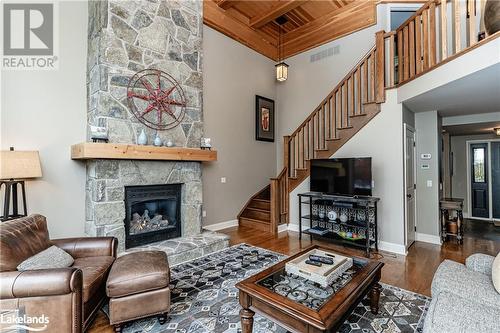 3876 Muskoka 118 Road W Unit# Carling 6-W4, Port Carling, ON - Indoor Photo Showing Living Room With Fireplace
