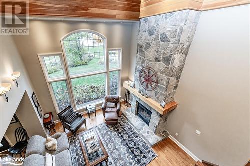 3876 Muskoka 118 Road W Unit# Carling 6-W4, Port Carling, ON - Indoor With Fireplace