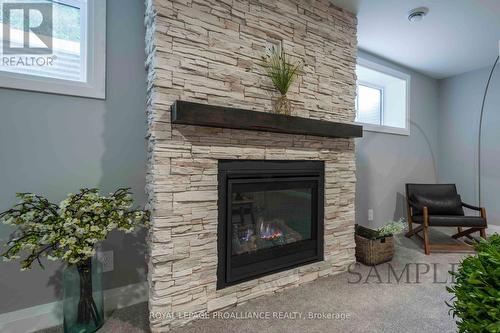 28 Mackenzie John Crescent, Brighton, ON - Indoor Photo Showing Living Room With Fireplace